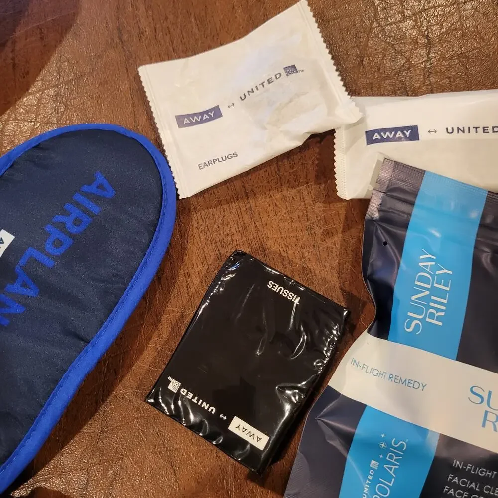 New AWAY Travel The Mini Suitcase Toiletry Case United Polaris Amenity Kit Pouch